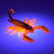 Green and orange soft plastic scorpion bait used for fishing under UV lighting. Fresh baitz alabama scorpion
